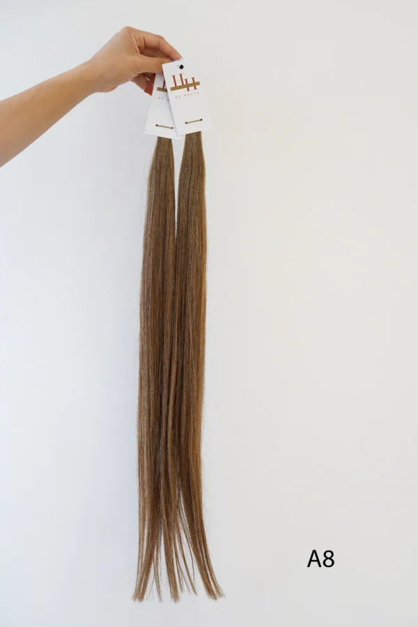 100% natural hair extensions - medium blonde with a golden shine